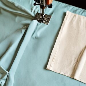 Attaching lining to the outer fabric for a DIY cosmetic pouch.